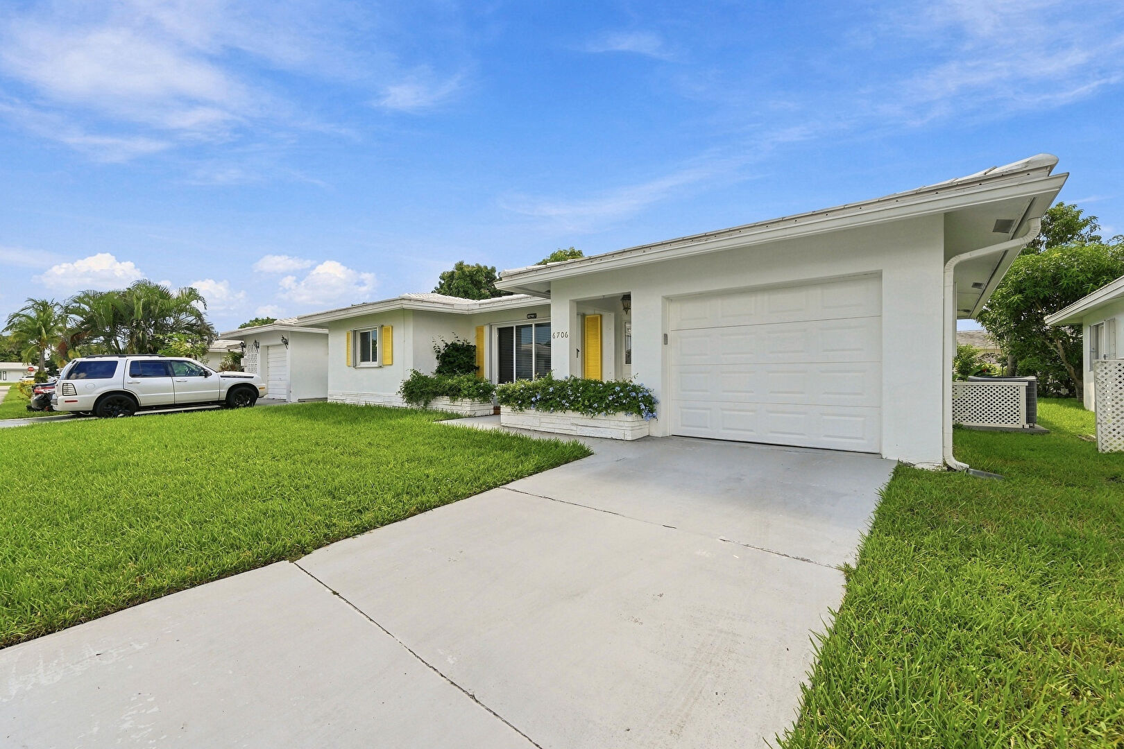 Front at 6706 NW 71 Court, Tamarac, FL 33321, listed by David Phelps