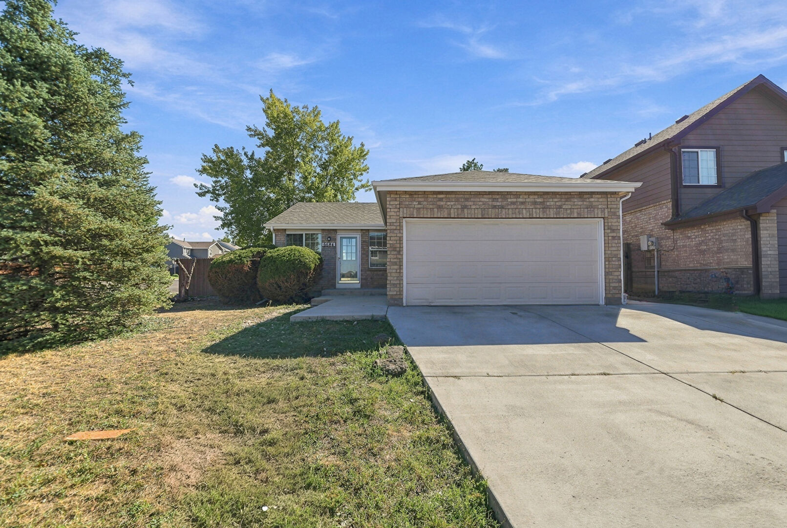 Front at 6684 Monaco Drive, Brighton, CO 80602, listed by Jayson Holland