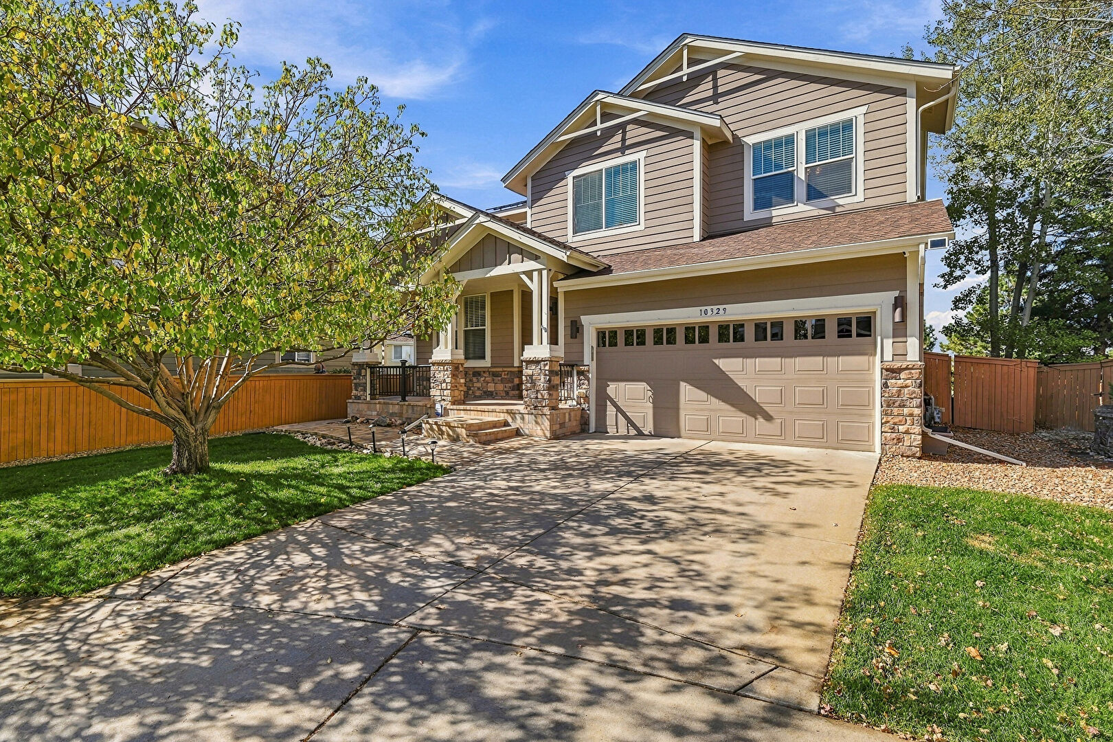 Front at 10329 Longwood Way, Highlands Ranch, CO 80130, listed by Nicole Hawkins