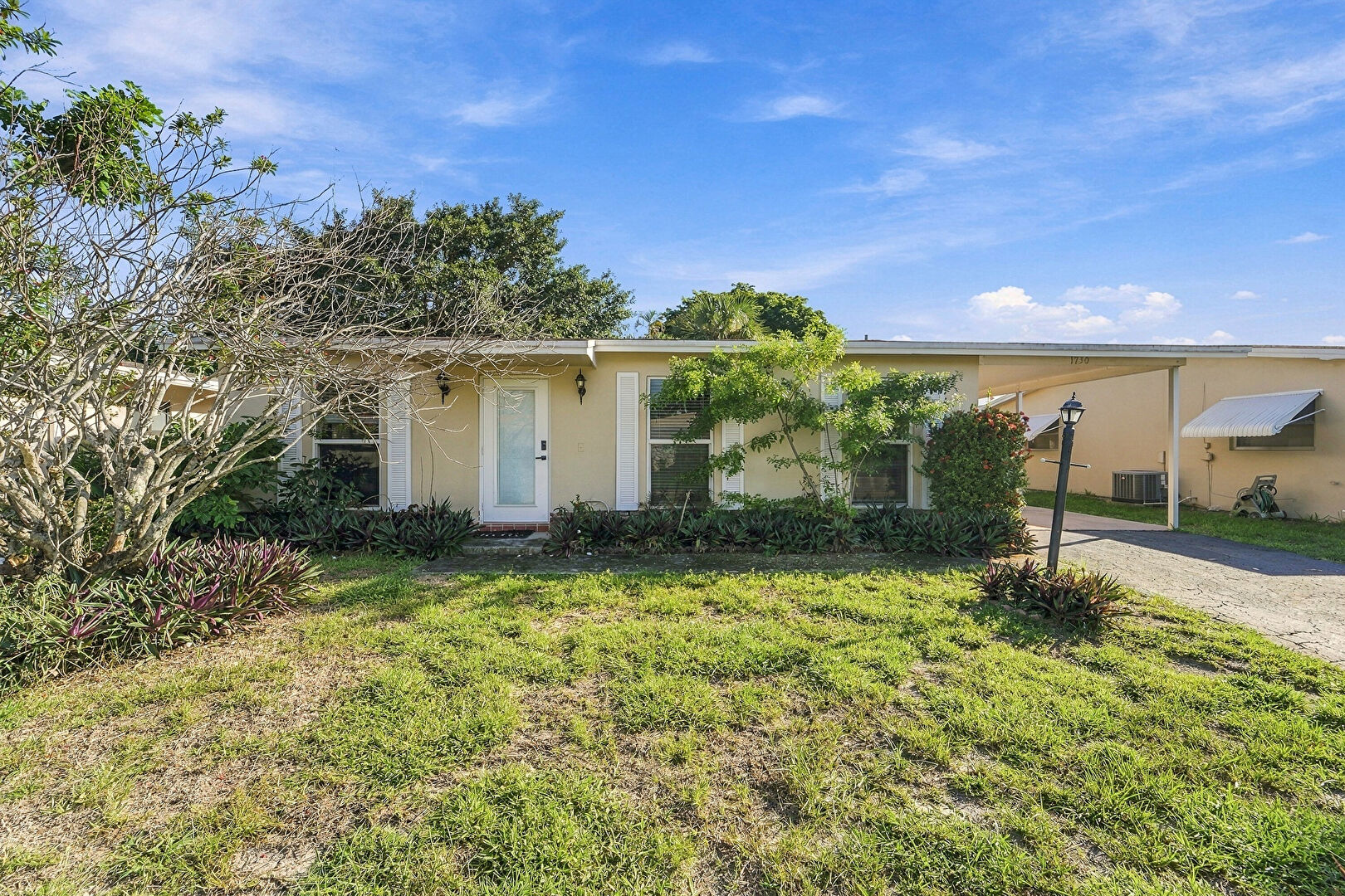 Front at 1730 Northwest 48th Place, deerfield beach, FL 33064, listed by Adrian Campbell