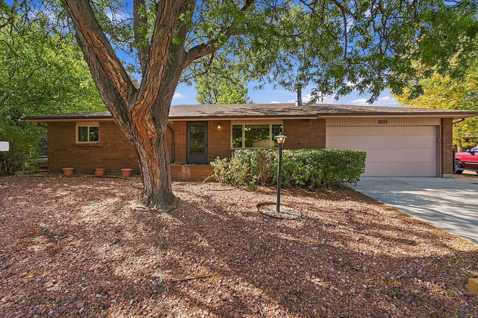 Front at 3233 Hawthorn Drive, Loveland, CO 80538, listed by Lindsey Crisanti