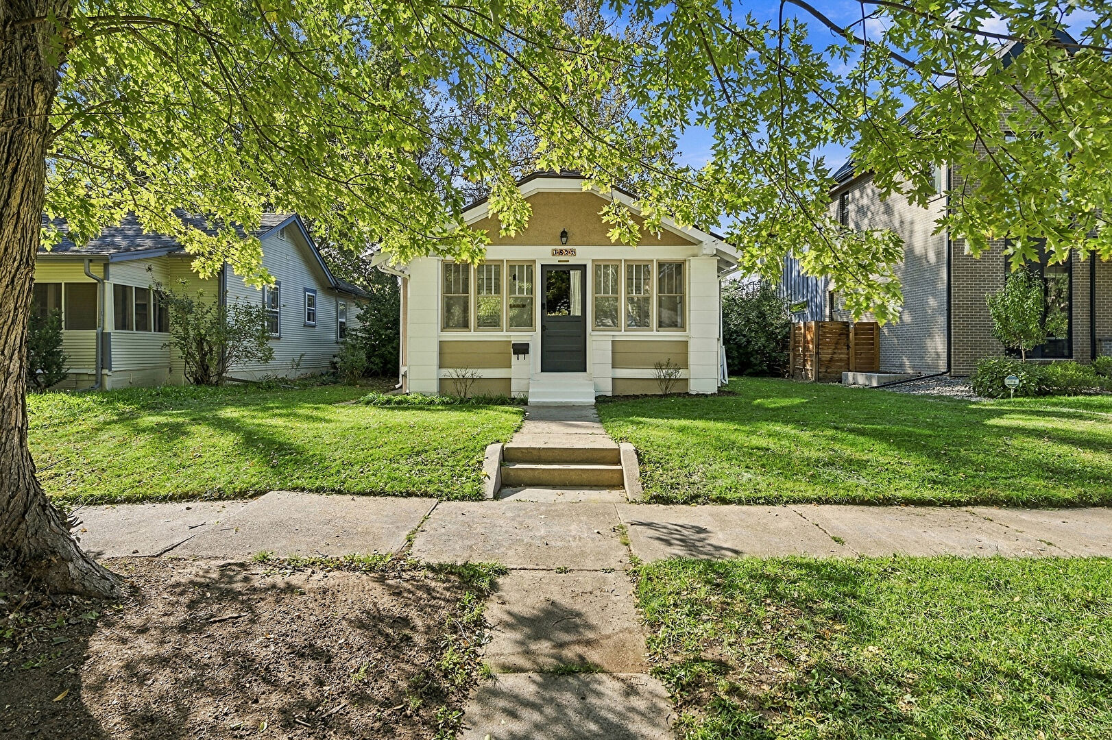 Front at 1877 South Gilpin Street, Denver, CO 80210, listed by Jaden Combs and Keith Combs
