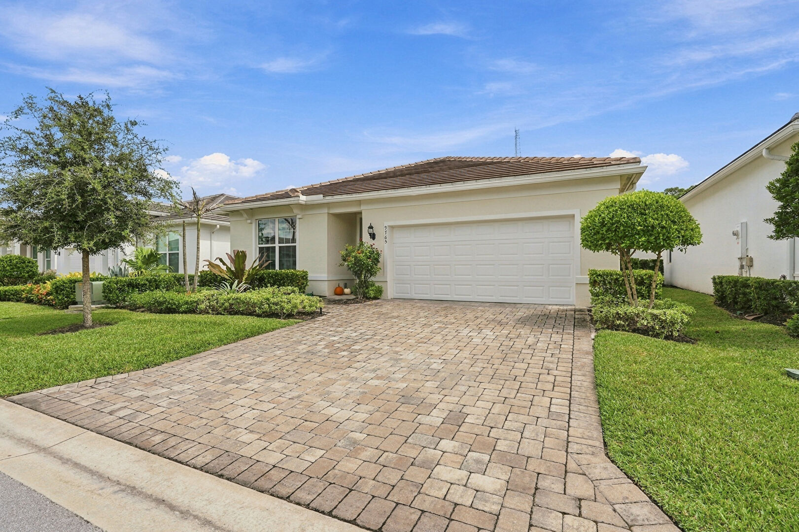 Front at 9765 Southwest Meridian Way, Stuart, FL 34997, listed by Cameron Post