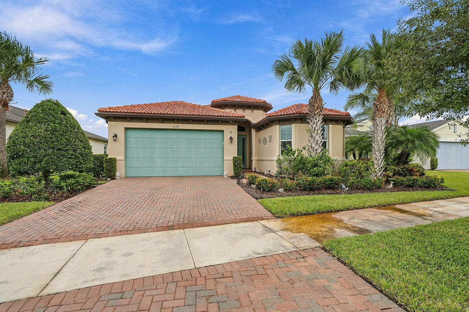 Front at 11331 Southwest Lake Park Drive, Port St. Lucie, FL 34987, listed by Manuel (Manny) Rey, MLS ID: B26086776