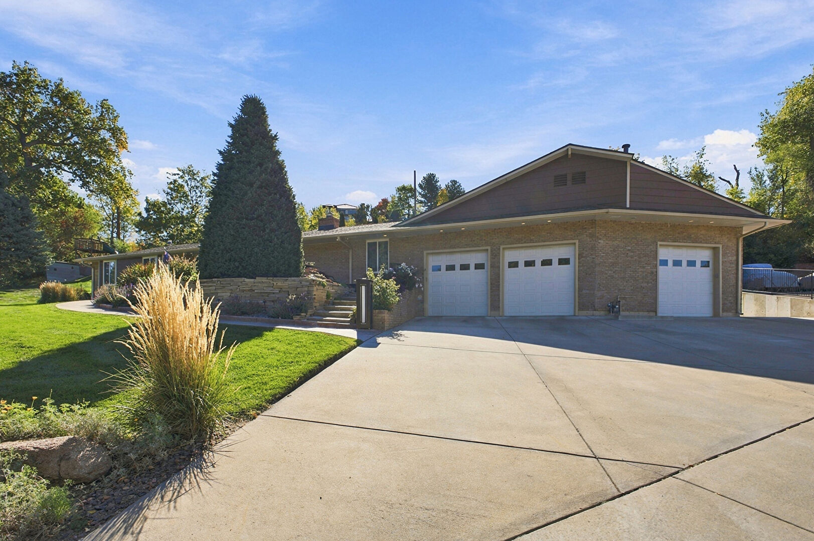 Front at 12070 West 18th Drive, Lakewood, CO 80215, listed by Julie Leins
