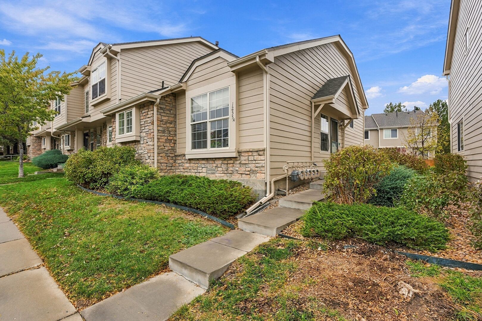 Front at 1255 S Zeno Circle A, aurora, CO 80017, listed by Regina Borja-Floyd