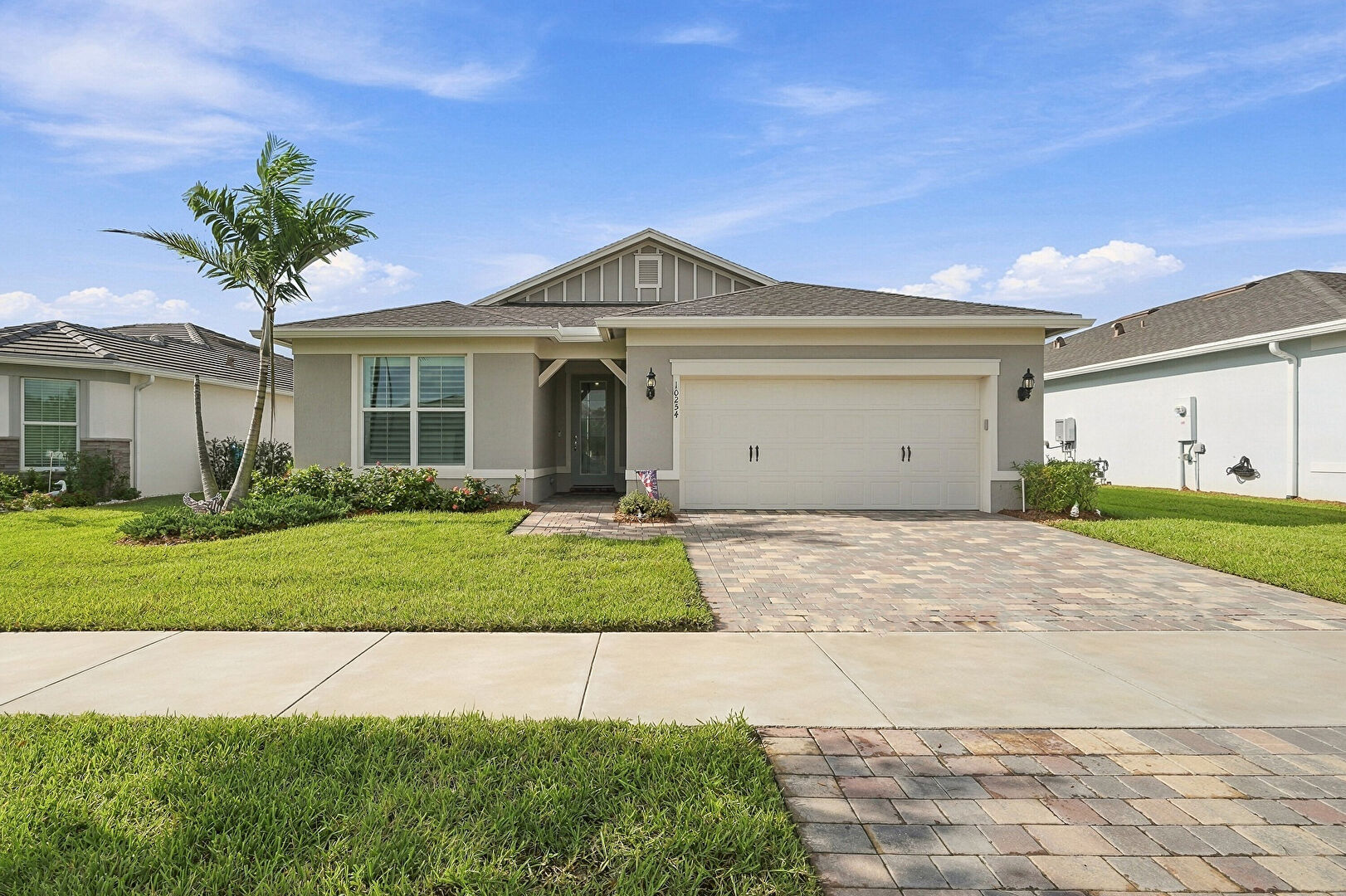 Front at 10254 SW Sarcoline Dr, Port St. Lucie, FL 34987, listed by Lori Coates