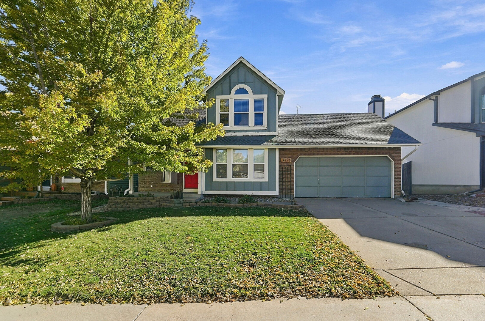 Front at 4276 South Halifax Way, Aurora, CO 80013, listed by Chris Baltazar
