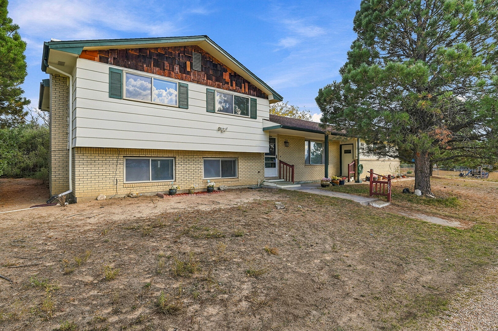 Front at 1653 Cragin Road, Colorado Springs, CO 80920, listed by Taylor Haas