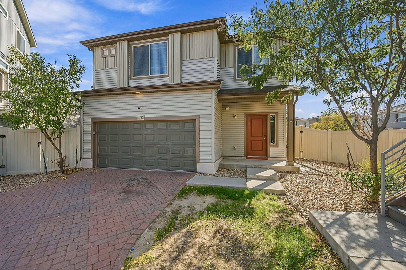 Exterior Entry at 4885 Halifax Court, Denver, CO 80249, listed by Kristen White