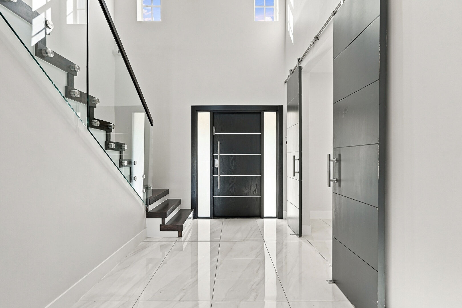 Foyer at 12099 Rockwell Way, Boca Raton, FL 33428, listed by Anna Cavalier