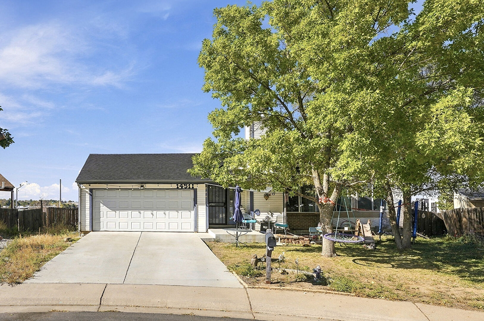 Front at 14511 East Walsh Place,, Aurora, CO 80012, listed by Foster Gillis