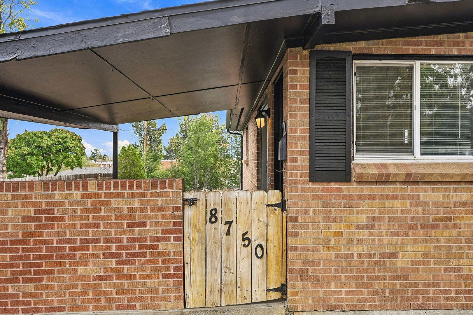Front at 8750 McElwain Boulevard, Denver, CO 80229, listed by Nadia Trevizo-Medina
