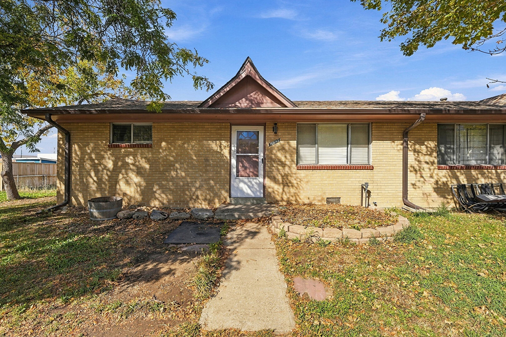 Front at 10685 West 48th Avenue, Wheat Ridge, CO 80033, listed by TED A KRONER