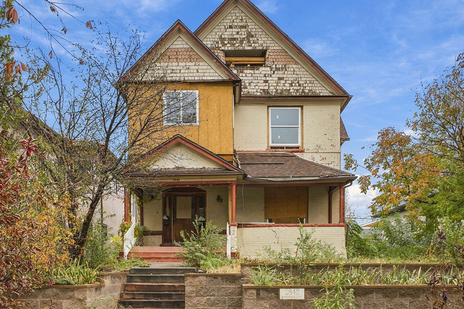 Front at 2842 Josephine Street, Denver, CO 80205, listed by Andria and Eric Stashak