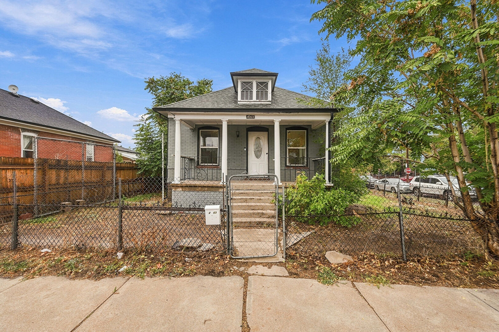 Front at 4363 Lincoln Street, Denver, CO 80216, listed by Debra Graves