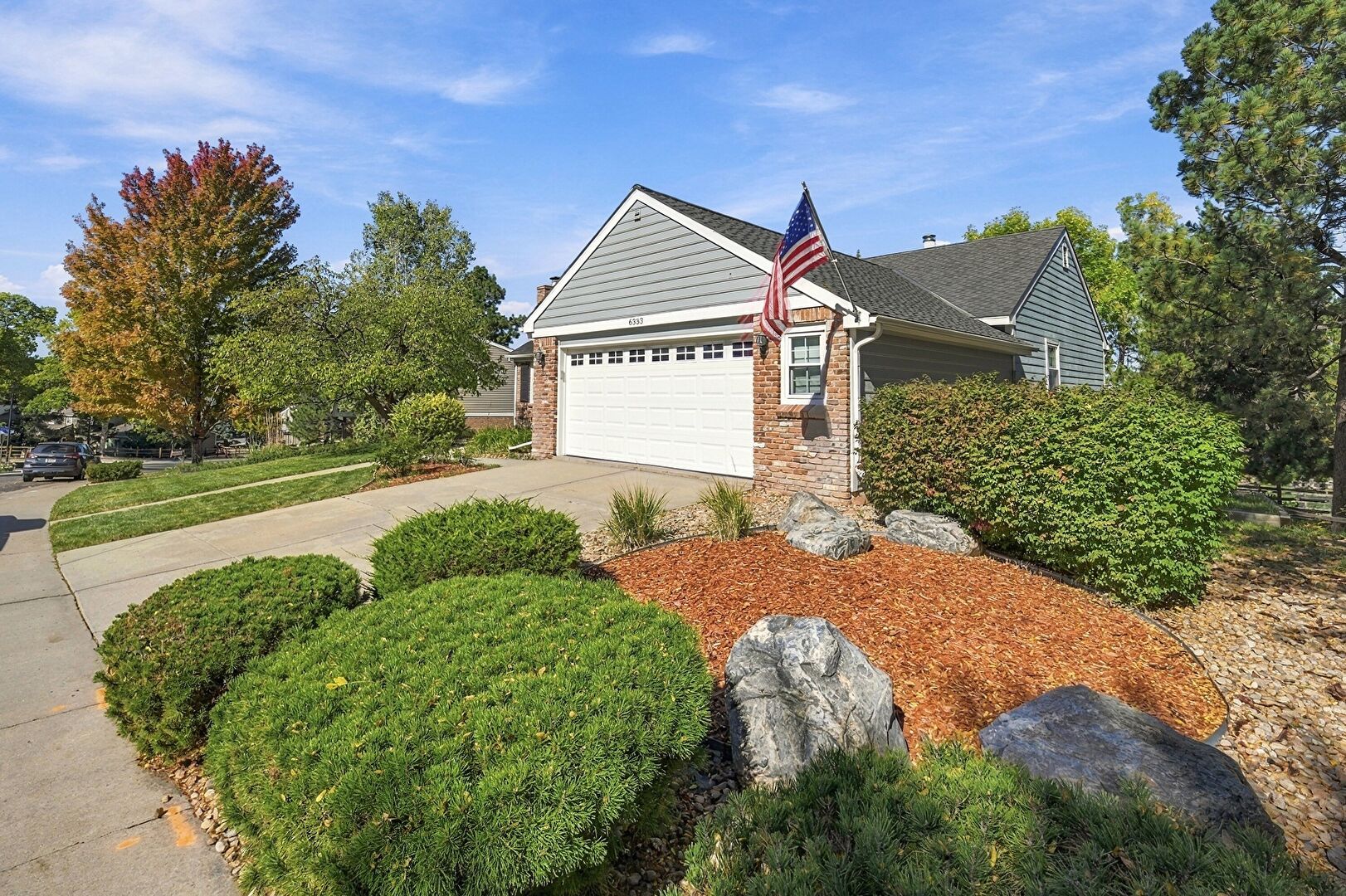 Front at 6333 East Jamison Circle South, Centennial, CO 80112, listed by Eric Johnson