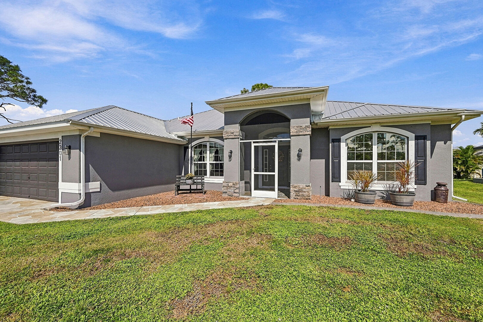 Front at 2301 Northeast 33rd Terrace, Cape Coral, FL 33909, listed by Brett Ellis