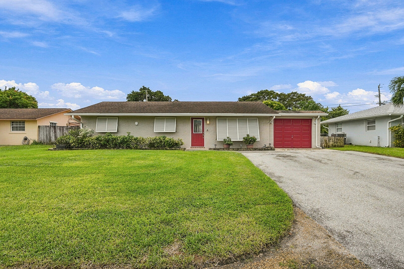 Exterior Entry at 4400 Crestdale Street, Palm Beach Gardens, FL 33410, listed by Richele Sirak, MLS ID: B26092283