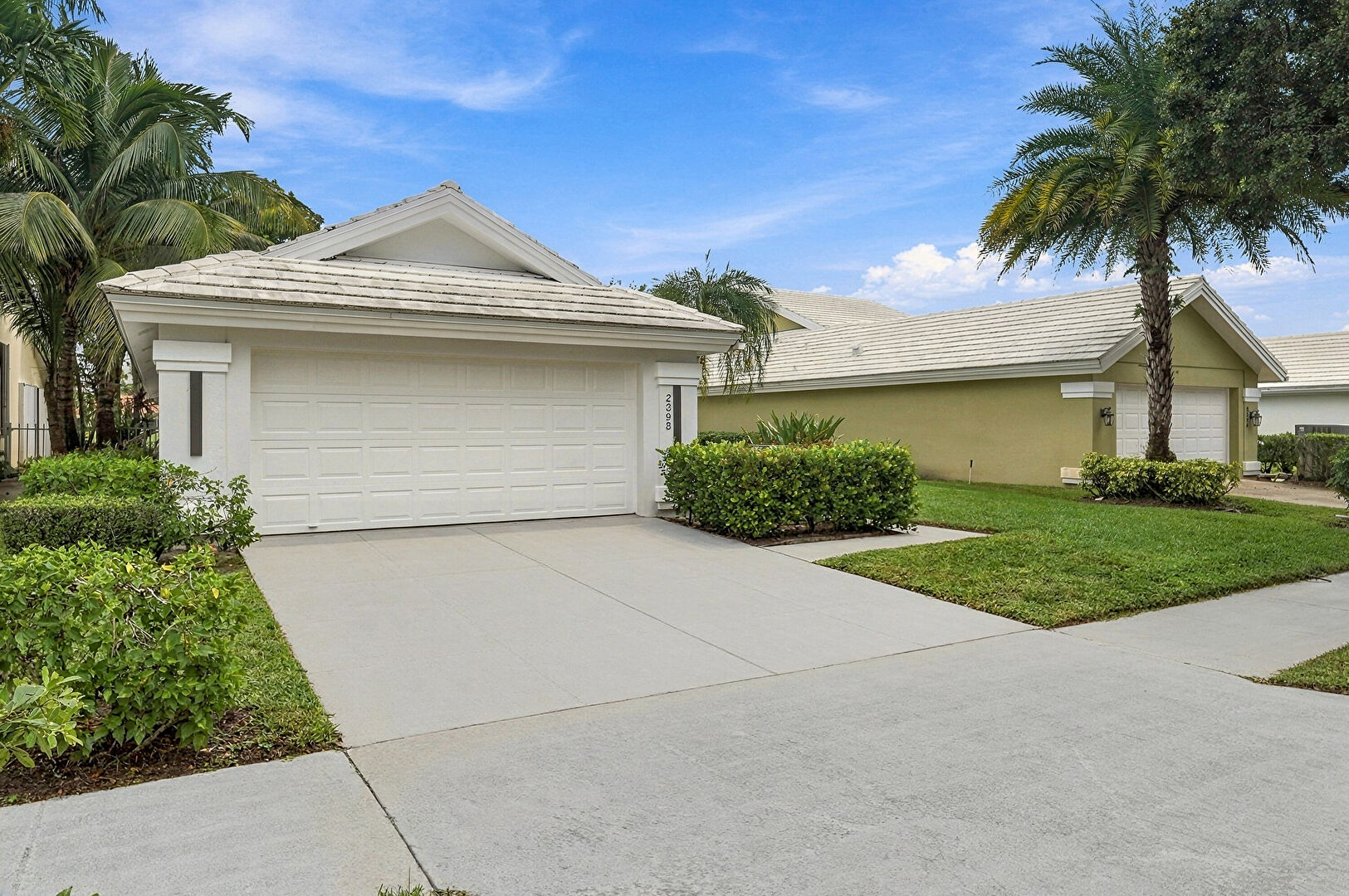 Front at 2398 Saratoga Bay Drive, West Palm Beach, FL 33409, listed by Ashlee Kilayko