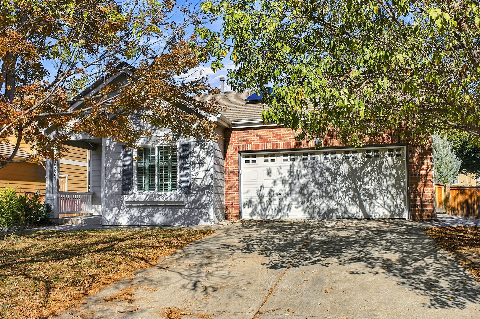 Front at 19691 E 59th Dr, Aurora, CO 80019, listed by Taylor Haas
