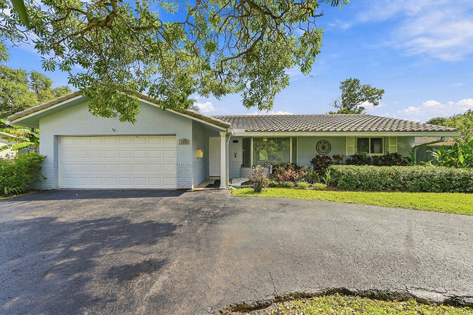 Front at 3801 Northwest 104th Avenue, Coral Springs, FL 33065, listed by Laura Sanders