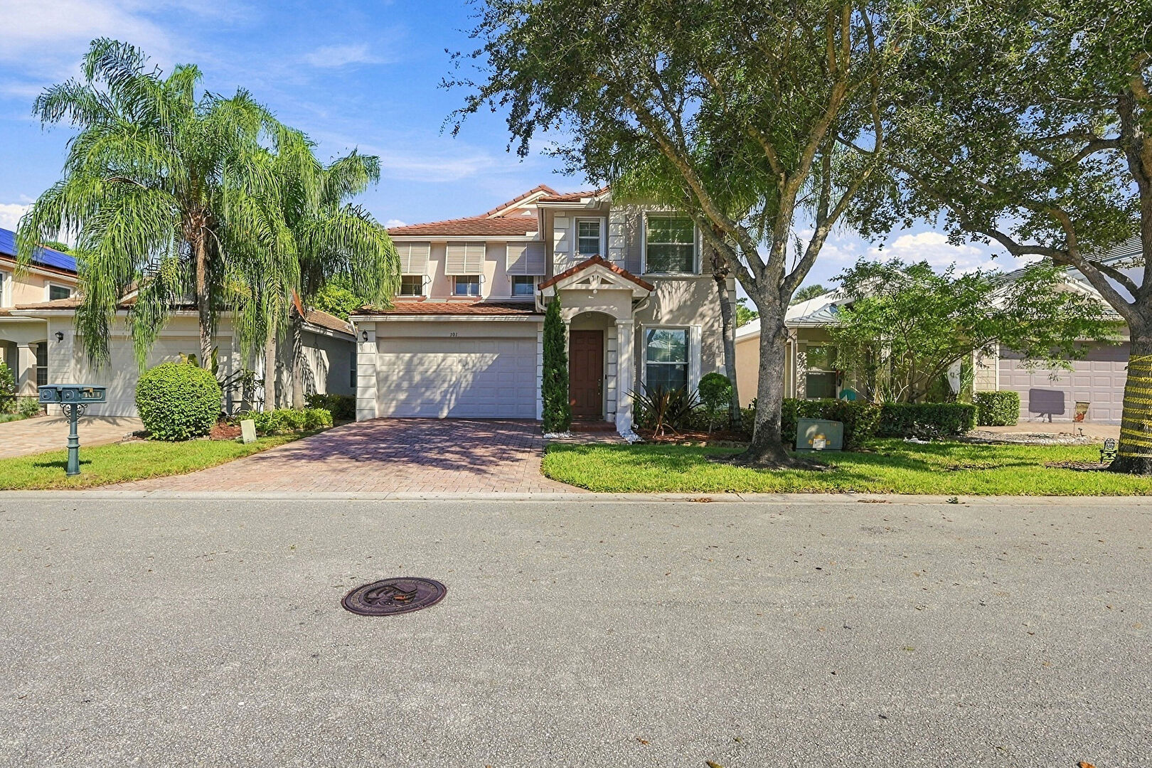 Front at 301 MULBERRY GROVE Road, West Palm Beach, FL 33411, listed by Marquely Celestin