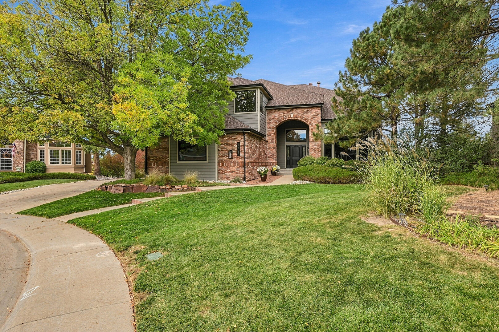 Front at 10563 Serengeti Drive, Lone Tree, CO 80124, listed by Marcia McCorkell