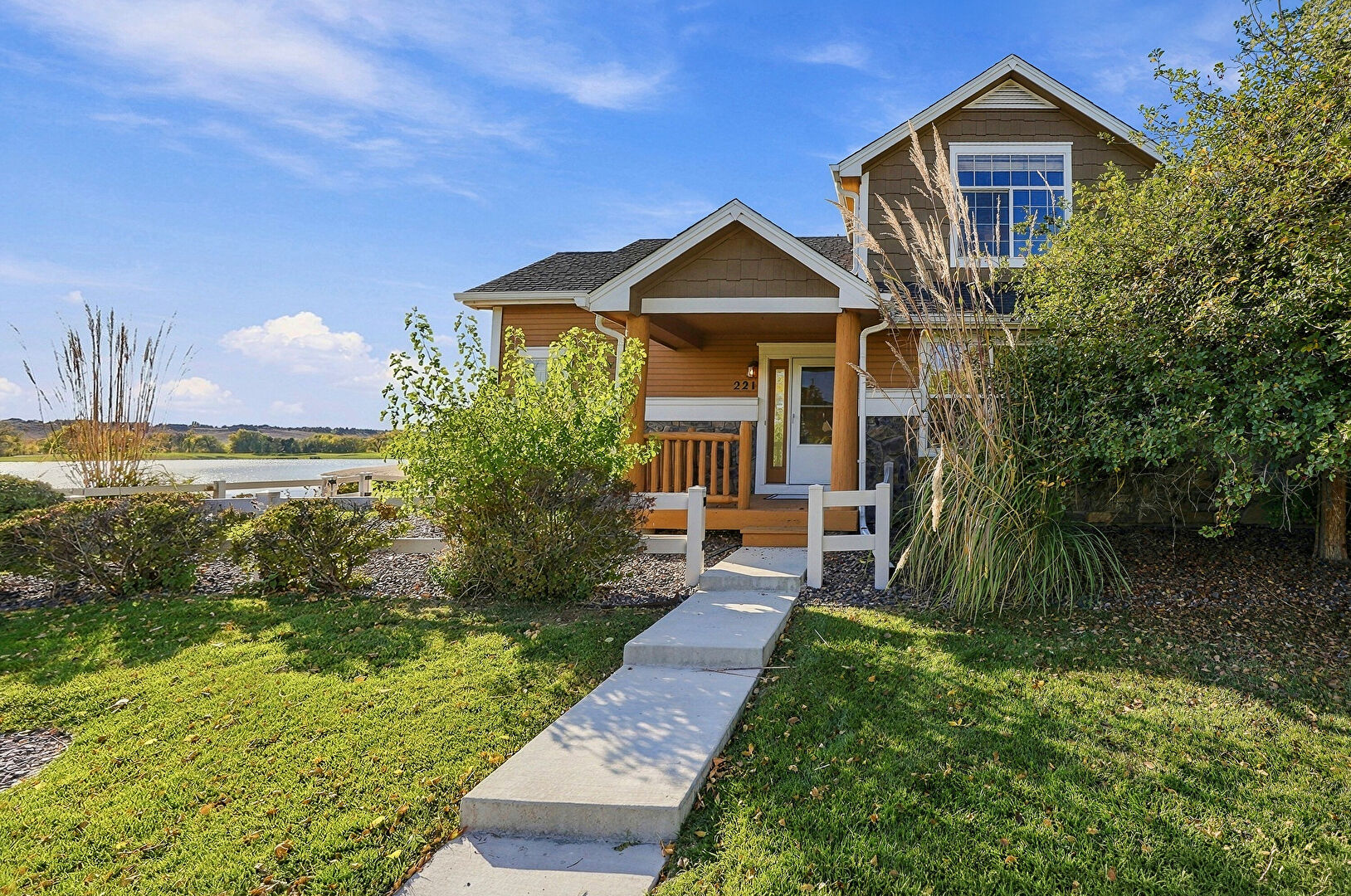 Front at 221 Habitat Circle, Windsor, CO 80550, listed by Shannon Blesener