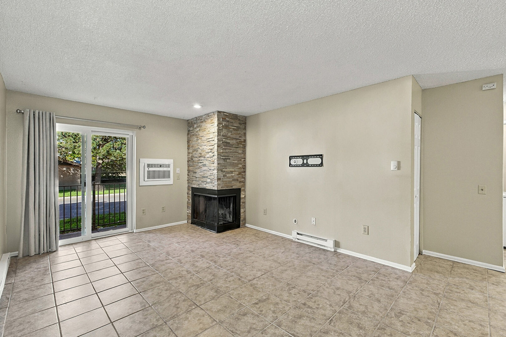 Living Room at 2280 South Oswego Way, Unit 102, Aurora, CO 80014, listed by Beth Gibson, MLS ID: 4698335
