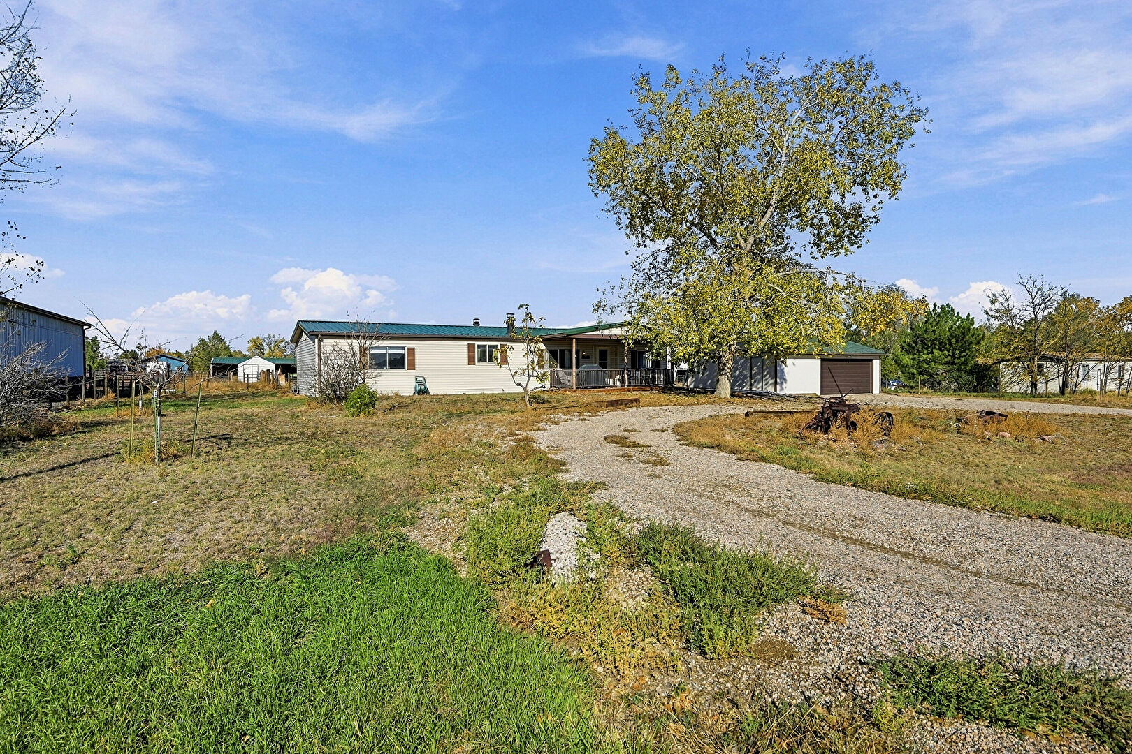 Front at 604 Pinyon Circle, Lochbuie, CO 80603, listed by Jody Malone