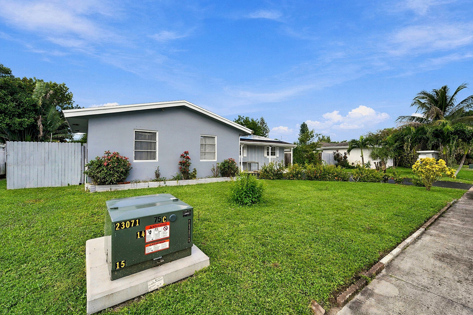 Front at 1159 Wynnewood Drive, West Palm Beach, FL 33417, listed by Lisa Levy