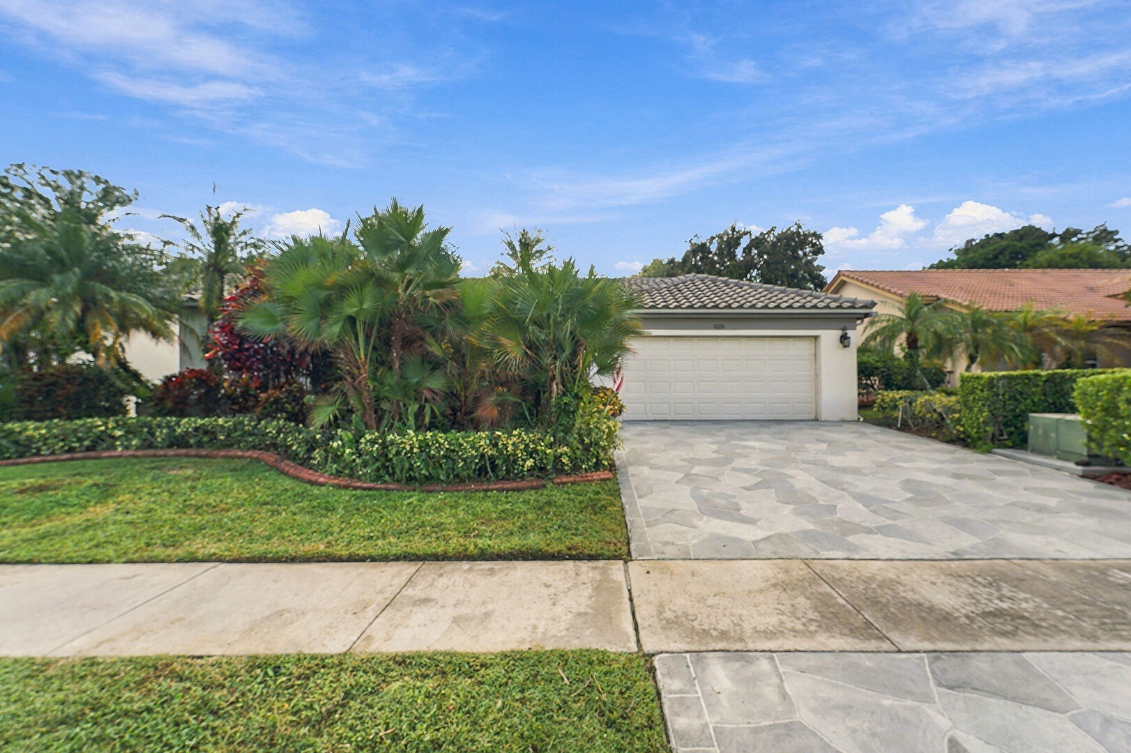 Front at 8291 Lake Cypress Road, Lake Worth, FL 33467, listed by David Castella