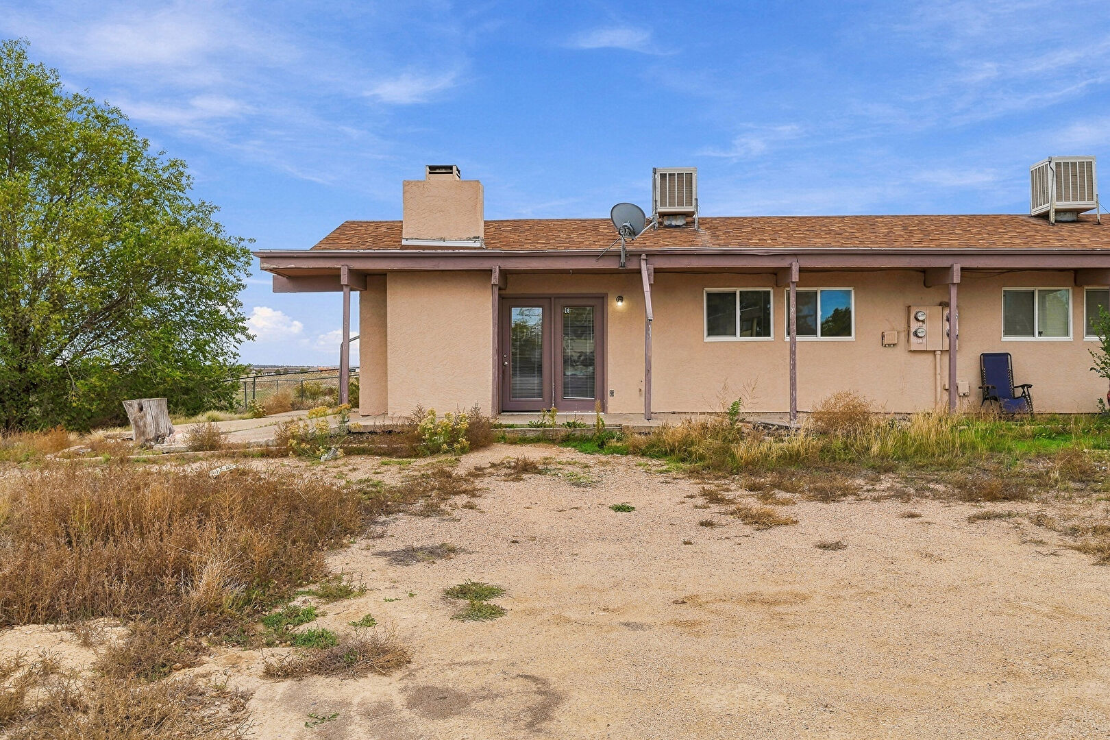 Front at 667 East Clarion Drive, Unit C, Pueblo West, CO 81007, listed by Jayson Holland