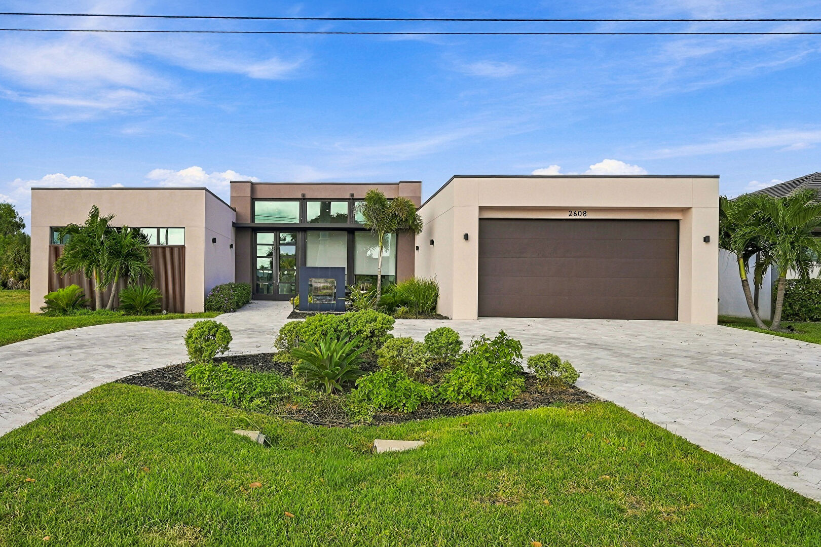 Front at 2608 SW 20th Ave, Cape Coral, FL 33914, listed by Cristine Marinelli Ernsdorff