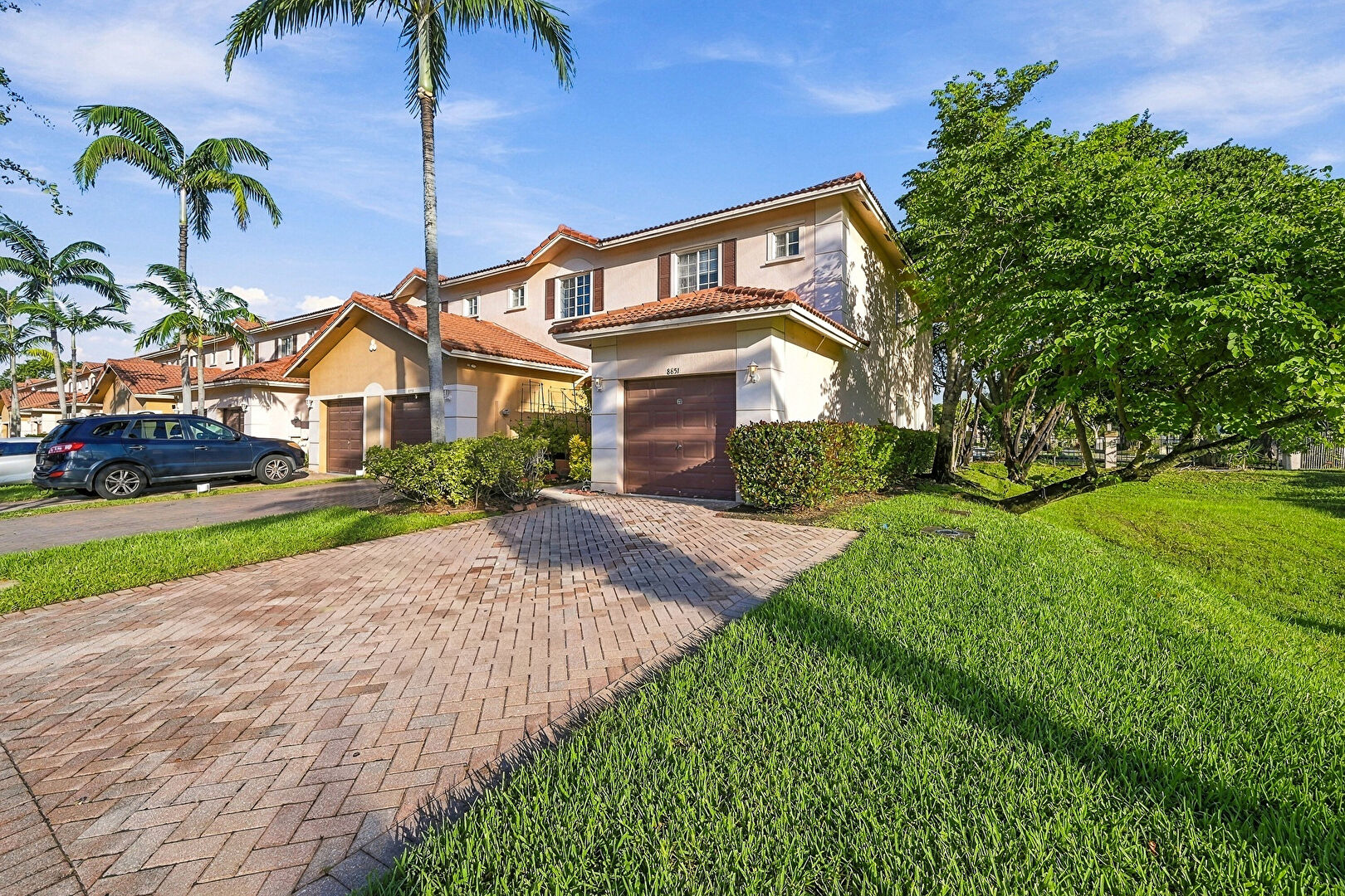 Front at 8851 North Isles Circle, Tamarac, FL 33321, listed by Laura Sanders
