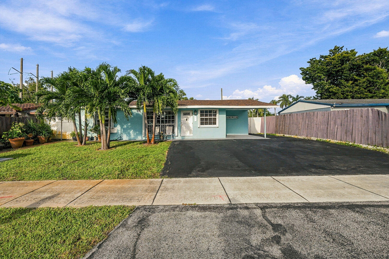 Front at 1761 SW 50TH Avenue, Fort Lauderdale, FL 33317, listed by Eugene Valdes