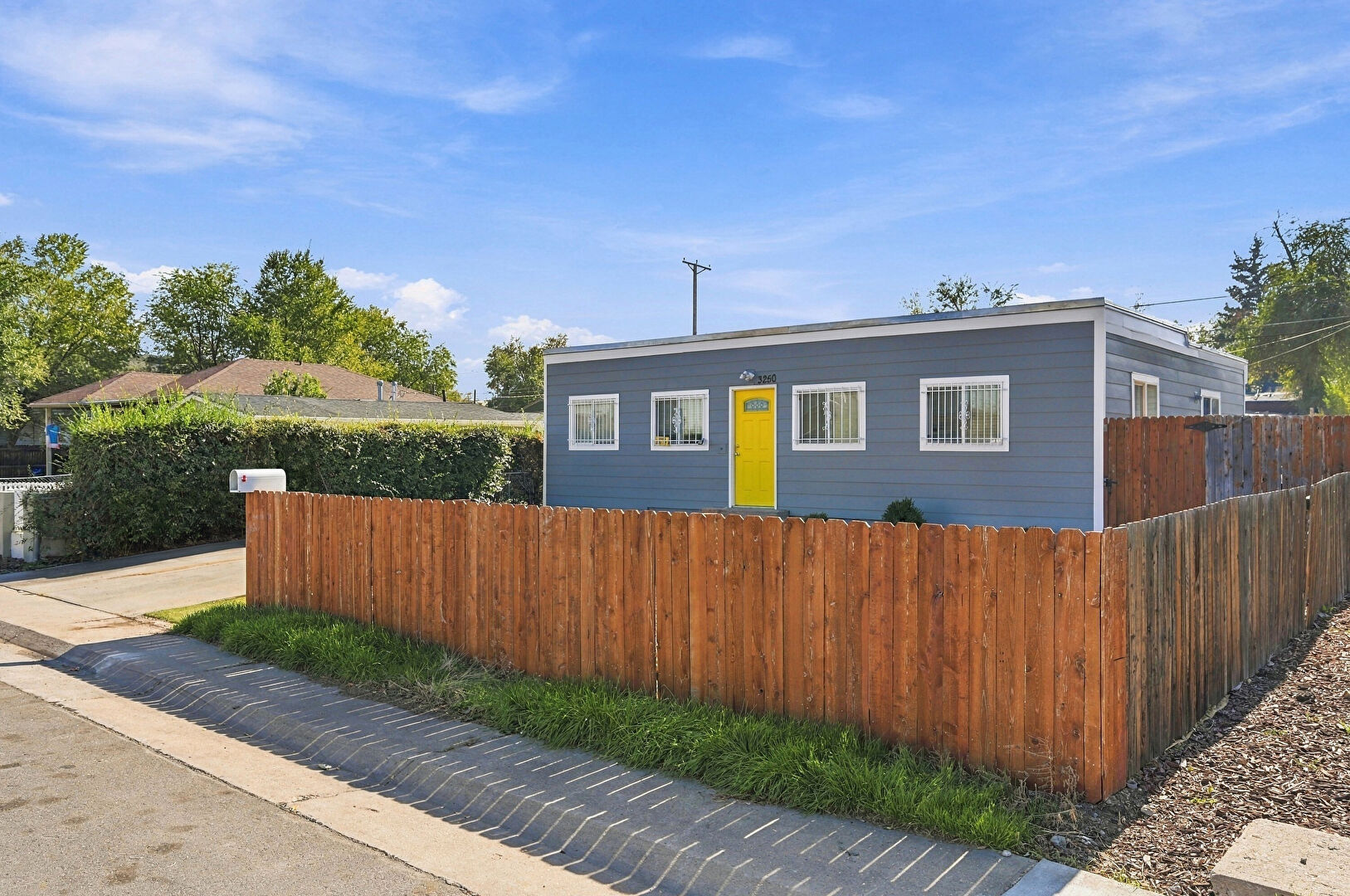 Front at 3250 West Center Avenue, Denver, CO 80219, listed by Luz Daniels